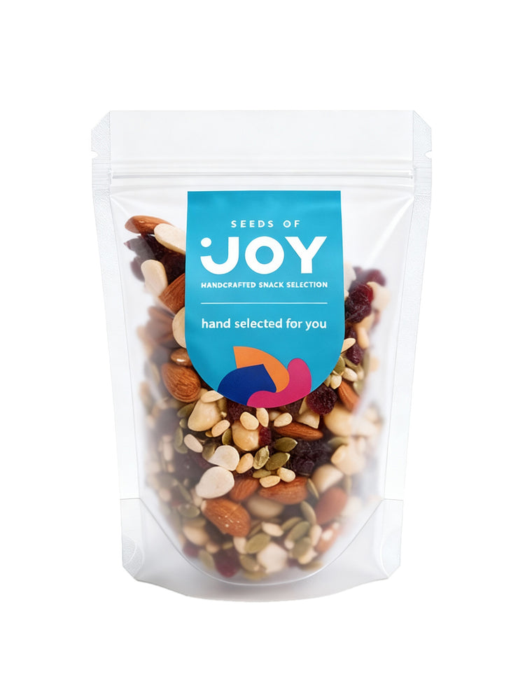 Seeds of Joy Protein Heart Mix front packaging. Hand selected for you. Ideal mix of Macadamia, Pine Nuts, Green Melon Seeds, Almonds and Dried cranberries