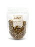 Seeds of Joy Organic Dark Hazelnut Granola front packaging. Hand selected for you. Delicious! Top your morning yogurt with it.