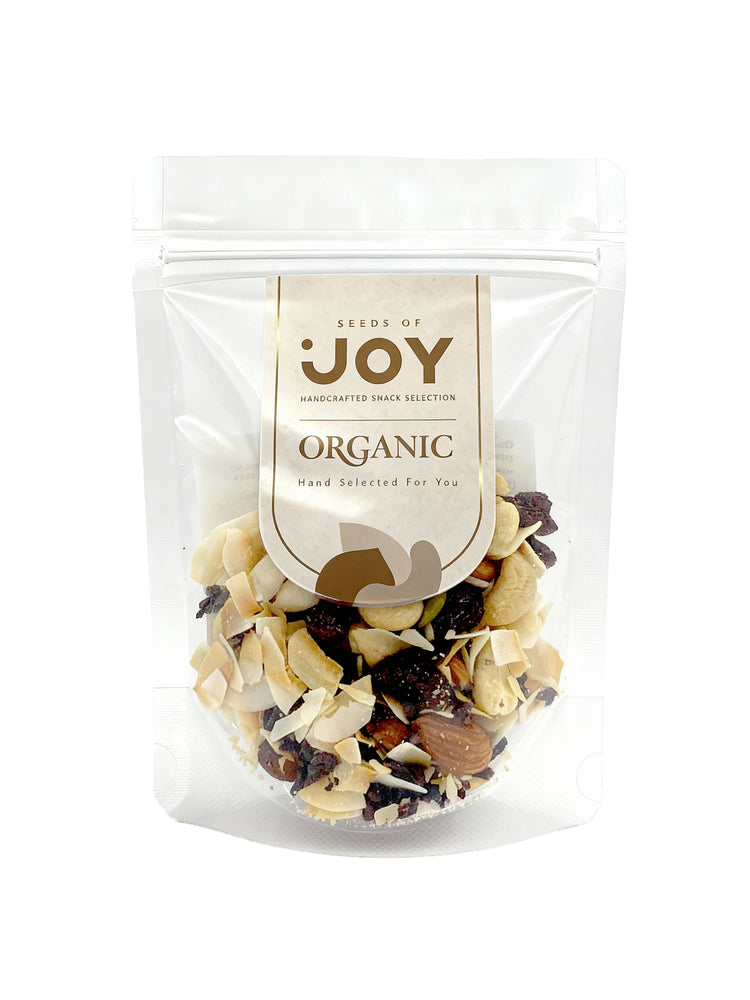 Seeds of Joy Organic Tropical Mix front packaging. Hand selected for you. Delicious! Ideal to share and also for toppings!